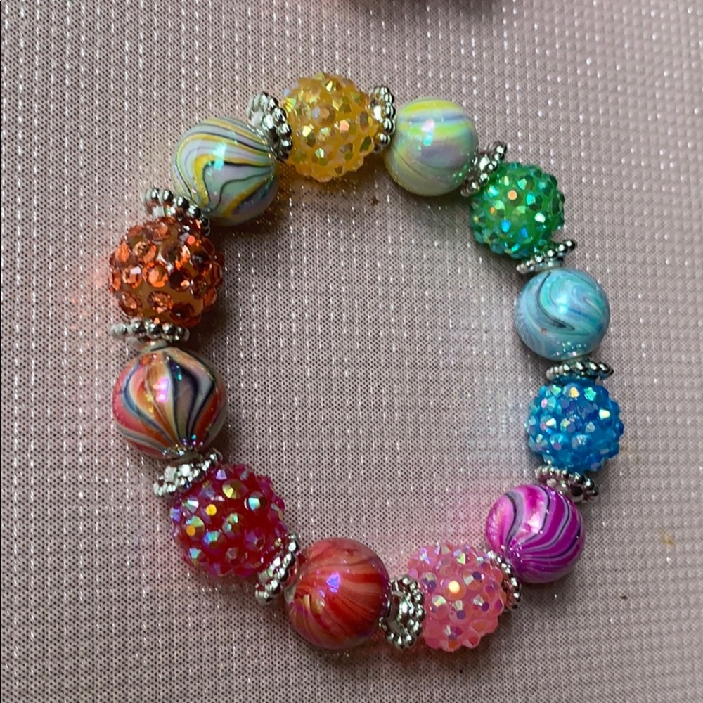 Two multi colored bracelets. - Picture 2 of 6